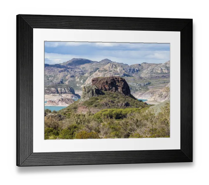 Framed Print : Volcanic rock formation at lake Laguna Verde west of Chile Chico