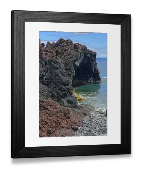 Framed Print : Rugged coastline with steep volcanic cliffs jutting out into the deep blue sea Framed Print : Rugged coastline with steep volcanic cliffs jutting out into the deep blue sea