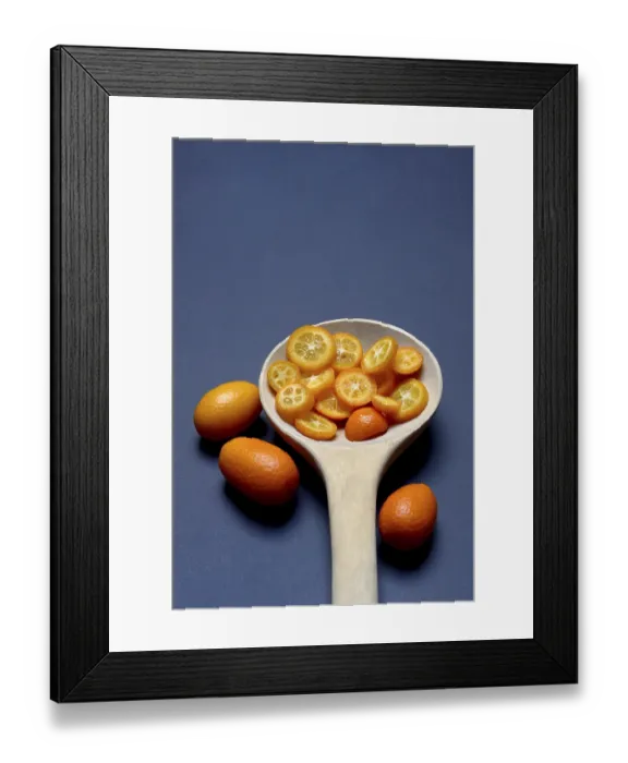 Framed Print : Kumquat (Fortunella) and kumquat slices in wooden ladle Framed Print : Kumquat (Fortunella) and kumquat slices in wooden ladle