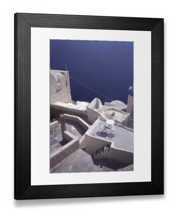 Framed Print : White houses above blue sea