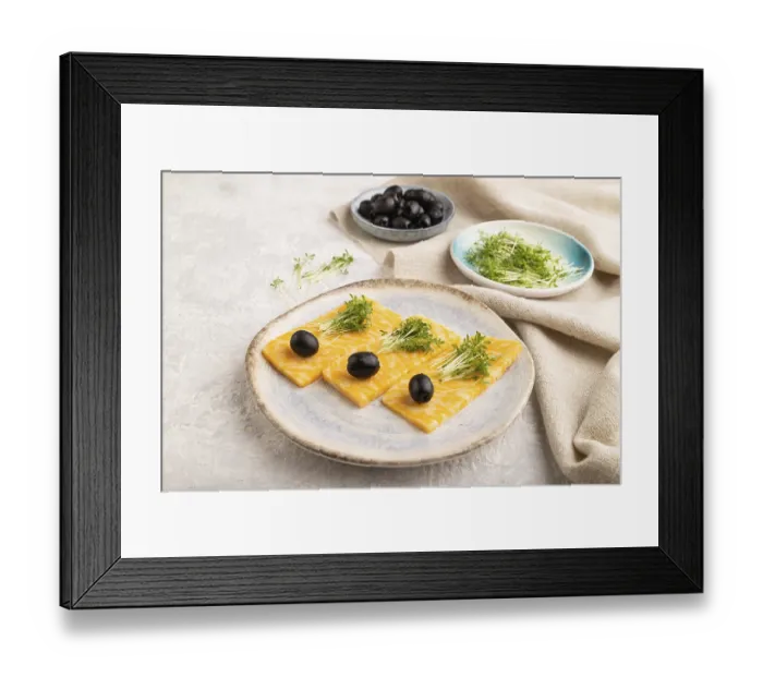 Framed Print : Marble cheese with olives and watercress microgreen on gray concrete background and linen textile