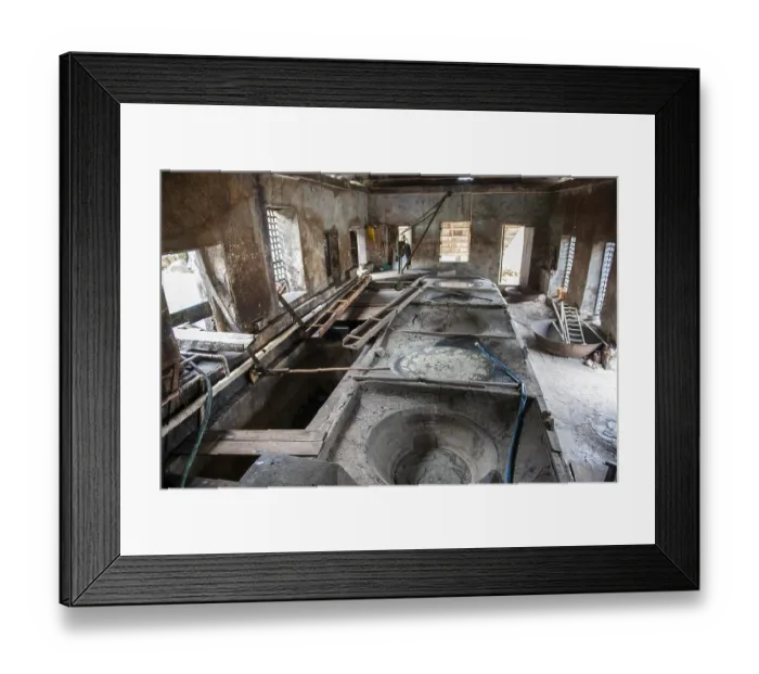 Framed Print : Container for molasses for traditional rum production