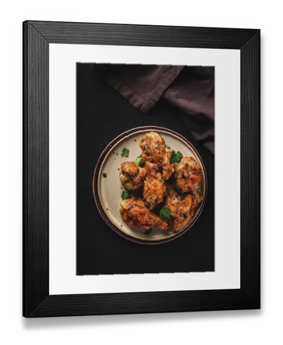 Framed Print : Fried chicken legs, breaded, with spices and herbs