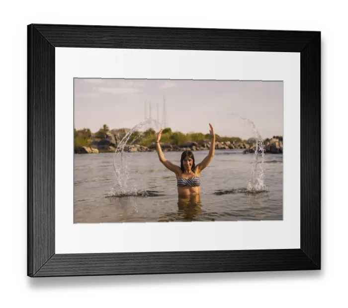 Framed Print : A young tourist bathing in the water of a Nubian village on the river Nile and near the city of Aswan Framed Print : A young tourist bathing in the water of a Nubian village on the river Nile and near the city of Aswan