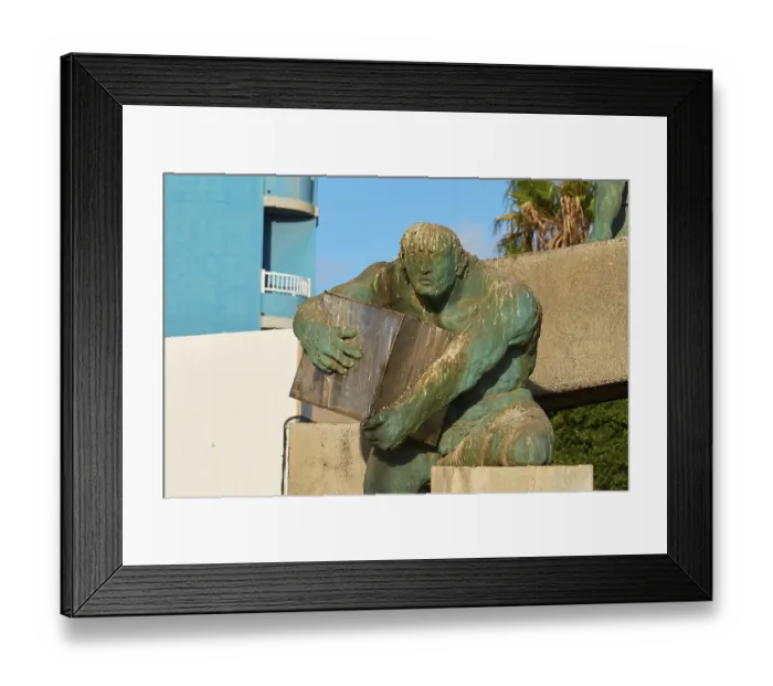 Framed Print : Bronze statue, man with cube, close