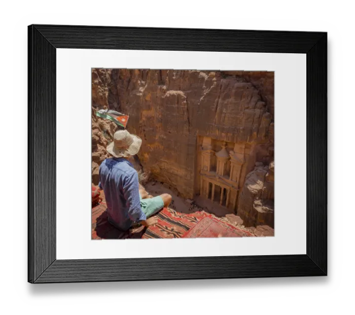 Framed Print : Tourist with sun hat sitting on carpet Framed Print : Tourist with sun hat sitting on carpet
