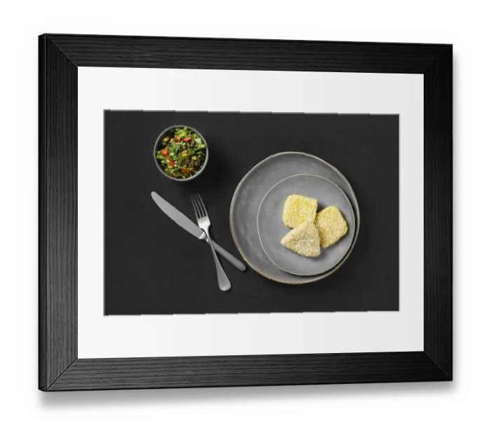 Framed Print : Top view of semifinished squid cutlet in breading on a plate Framed Print : Top view of semifinished squid cutlet in breading on a plate