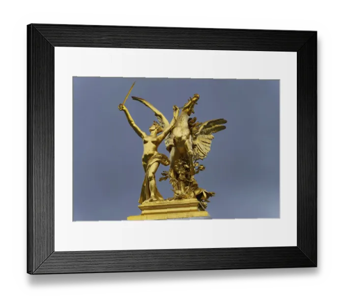 Framed Print : Column with the group of figures Fama in battle on the Pont Alexandre III bridge over the Seine Framed Print : Column with the group of figures Fama in battle on the Pont Alexandre III bridge over the Seine