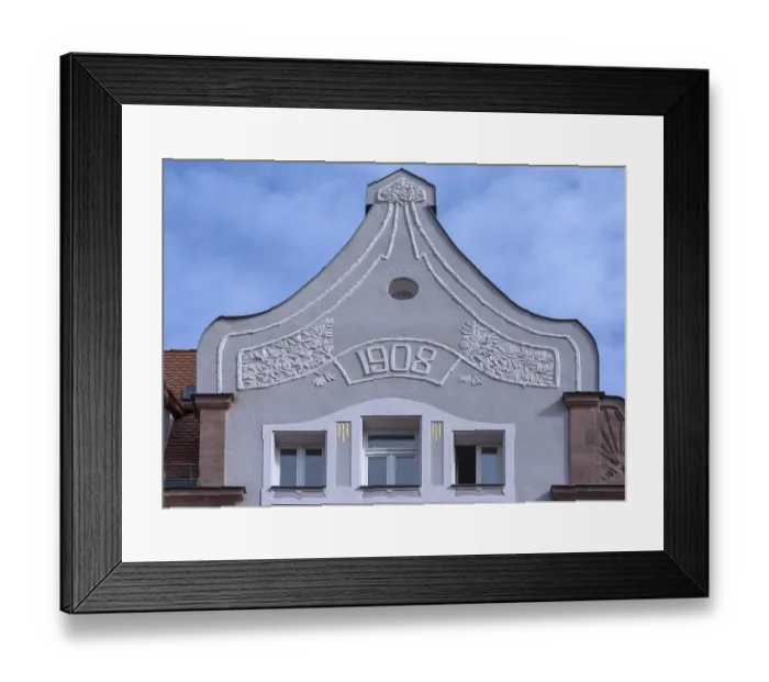 Framed Print : Art Nouveau relief on the gable of a residential house