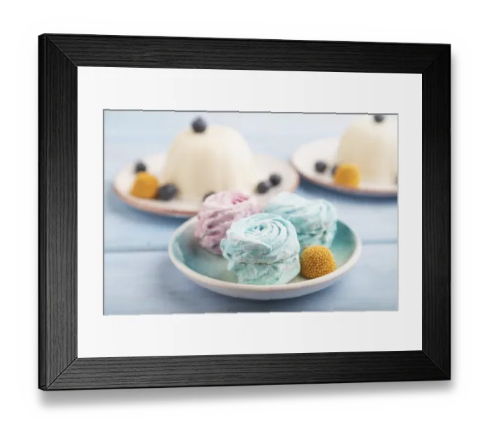 Framed Print : White milk jelly with marshmallow on blue wooden background Framed Print : White milk jelly with marshmallow on blue wooden background
