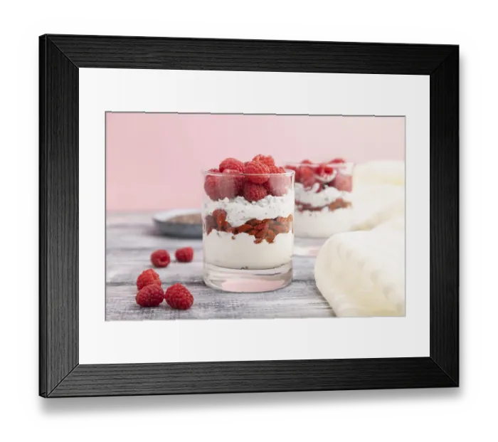 Framed Print : Yogurt with raspberry, goji berries and chia seeds in glass on gray wooden background and linen textile