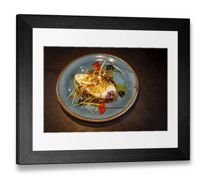 Framed Print : Fried squid with sauce on a black background Framed Print : Fried squid with sauce on a black background