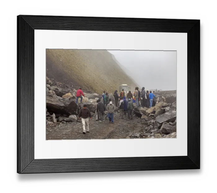 Framed Print : A group of people is active together on a rocky road in a foggy mountain landscape Framed Print : A group of people is active together on a rocky road in a foggy mountain landscape