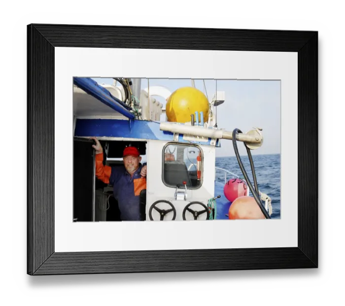 Framed Print : Fisherman in fishing boat Framed Print : Fisherman in fishing boat