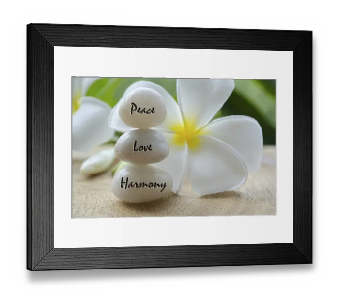 Framed Print : Peace, Love and Harmony text on white zen stones with beautiful white flower background