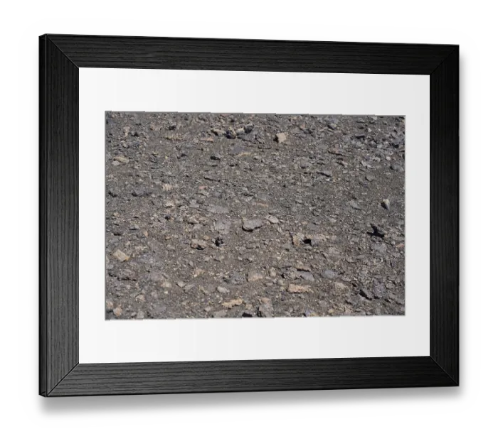 Framed Print : Close view of a volcanic ground covered with small rocks and rough texture Framed Print : Close view of a volcanic ground covered with small rocks and rough texture