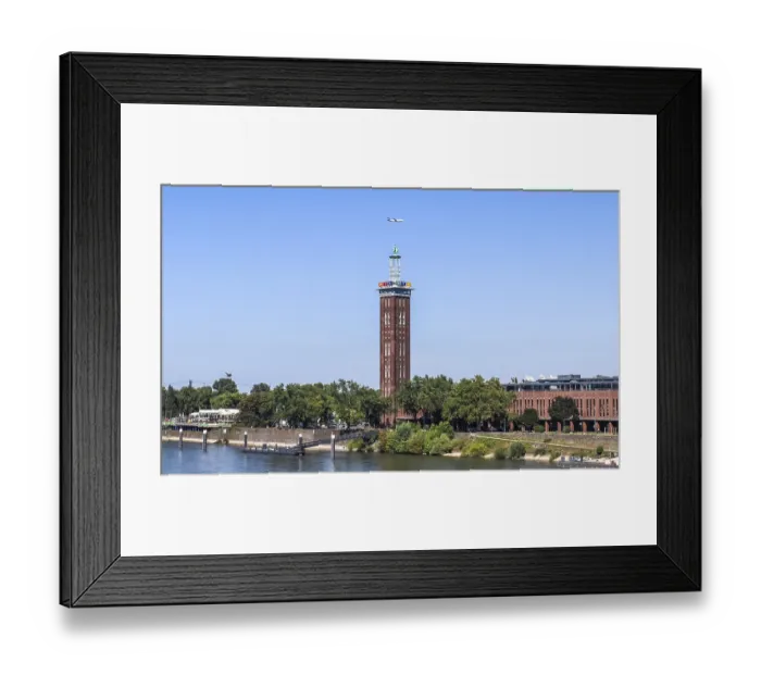 Framed Print : Cologne, Germany - 30. July 2024: View of the tower of the RTL television station on the banks of the Rhine in Cologne
