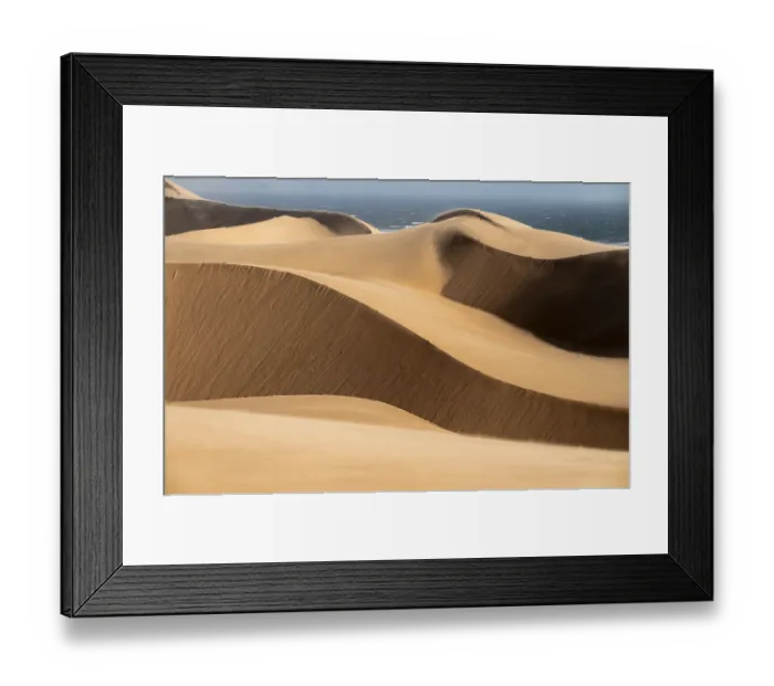 Framed Print : Sand dunes and sea in evening light Framed Print : Sand dunes and sea in evening light