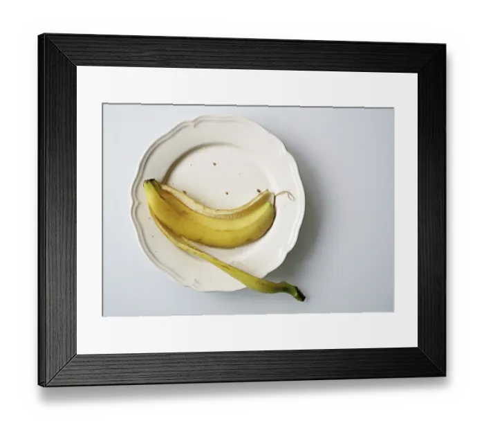 Framed Print : Empty banana peel on a plate, Germany