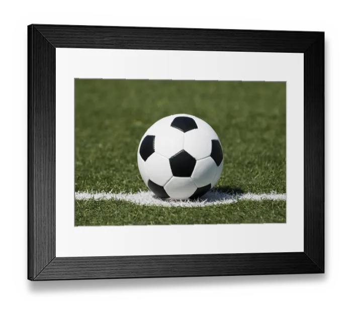 Framed Print : Classic black-and-white football lying on the kick-off point