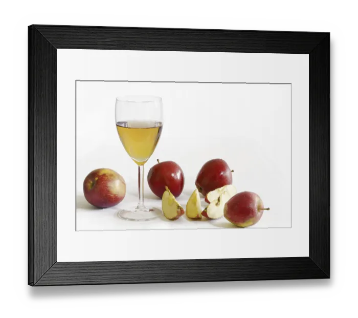 Framed Print : Apple juice in a glass, red apples