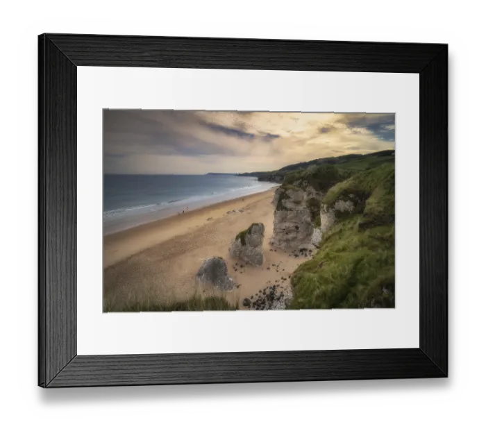 Framed Print : People walking on White Rocks Beach with limestone rock formations at sunset