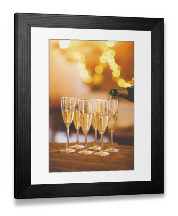Framed Print : Champagne glasses on gold background Framed Print : Champagne glasses on gold background