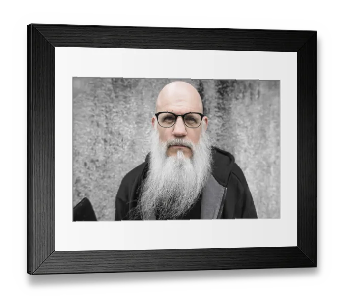 Framed Print : Portrait of mature bald man with long gray beard against grunge concrete wall outdoors Framed Print : Portrait of mature bald man with long gray beard against grunge concrete wall outdoors