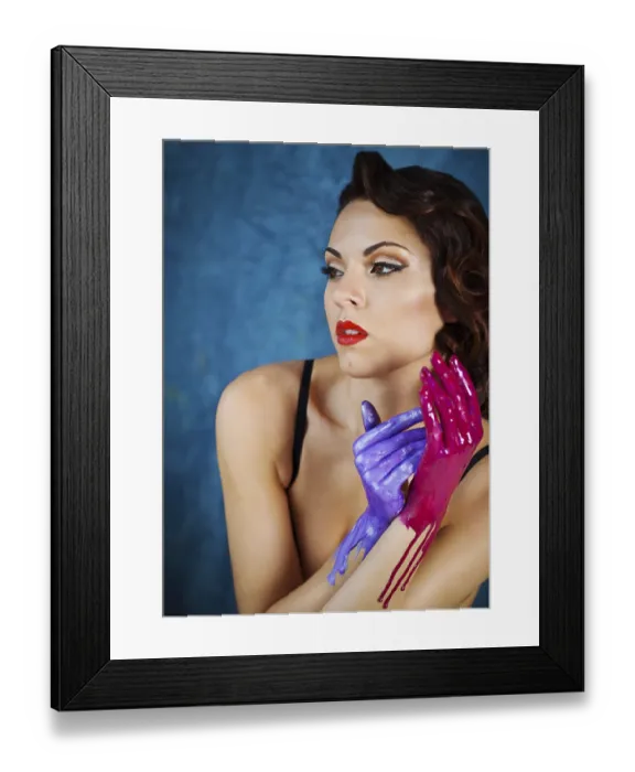 Framed Print : Portrait of a beautiful young woman with bright make up and colored splashes hands