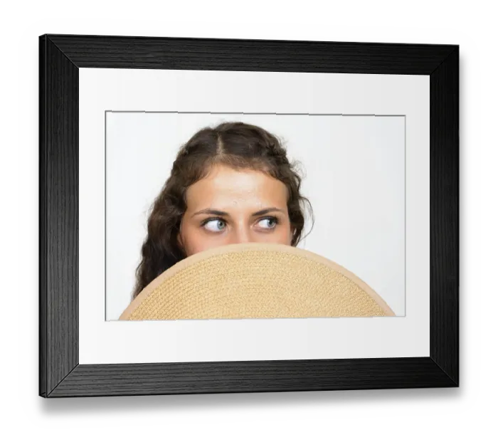 Framed Print : Studio shot of young beautiful tourist woman with curly hair in bikini ready for vacation against white background
