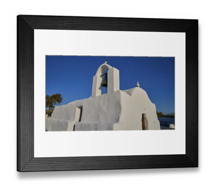 Framed Print : Panagia Tourliani, white church with bell and cross in clear blue sky Framed Print : Panagia Tourliani, white church with bell and cross in clear blue sky