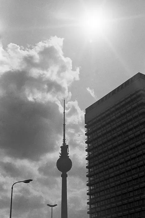 Framed Print : 15.08.1983, GDR, East Berlin, evening mood at Alexanderplatz, silhouette of the television tower and the Haus des Reisens Framed Print : 15.08.1983, GDR, East Berlin, evening mood at Alexanderplatz, silhouette of the television tower and the Haus des Reisens
