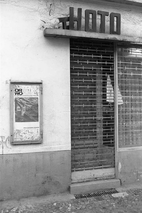 Framed Print : 17.11.1981, GDR, East Berlin, Prenzlauer Berg district, Kollwitzplatz, entrance to a closed photo shop with an advertising poster for ORWO films East Berlin, Berlin-Prenzlauer Berg, GDR GDR