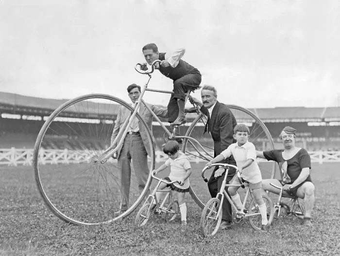 Framed Print : 1930s bicycles. The annual Fete des Caf Conc at the Buffalo Stadium and some of the popular artists on their bicycles
