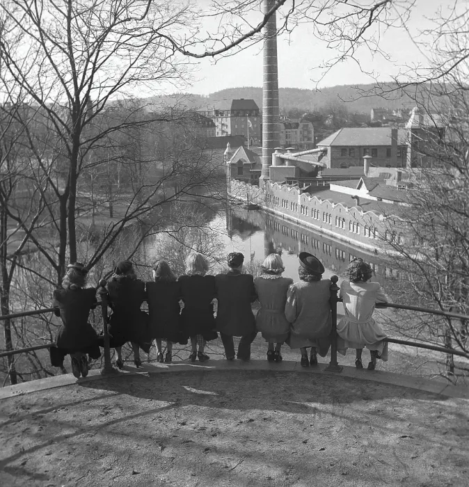 Framed Print : In the 1940s. A group of women and only one man Framed Print : In the 1940s. A group of women and only one man