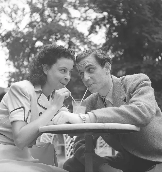 Framed Print : 1940s lifestyle. A young couple at an outdoor cafe Framed Print : 1940s lifestyle. A young couple at an outdoor cafe