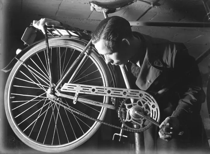 Framed Print : 1940s man with bicycle