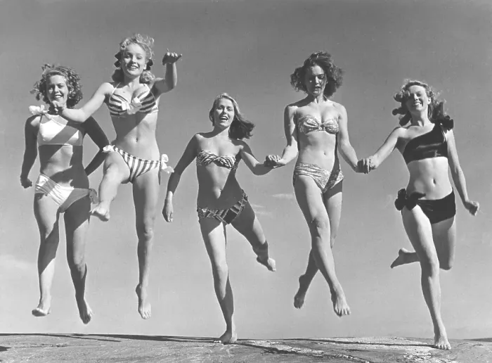 Framed Print : 1940s summer. A group of young women in their bikinis are happy on this summer's day Framed Print : 1940s summer. A group of young women in their bikinis are happy on this summer's day
