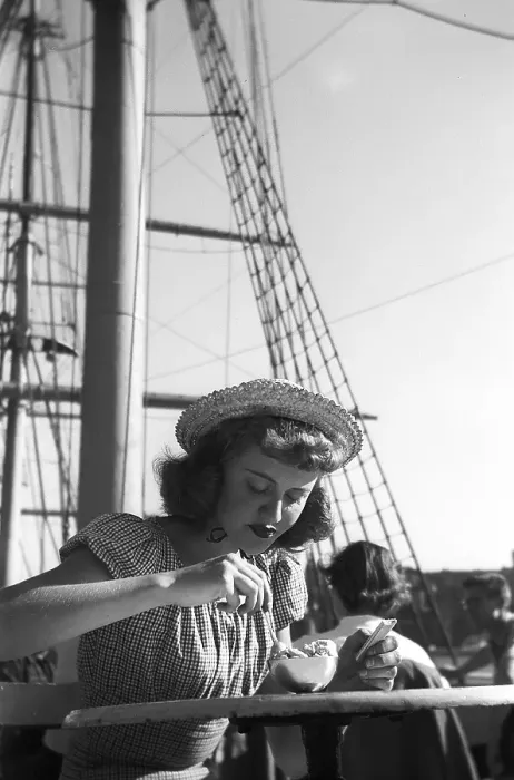 Framed Print : In the 1940s. A young woman is visiting Swedens captial city Stockholm and is pictured enjoying the sunshine