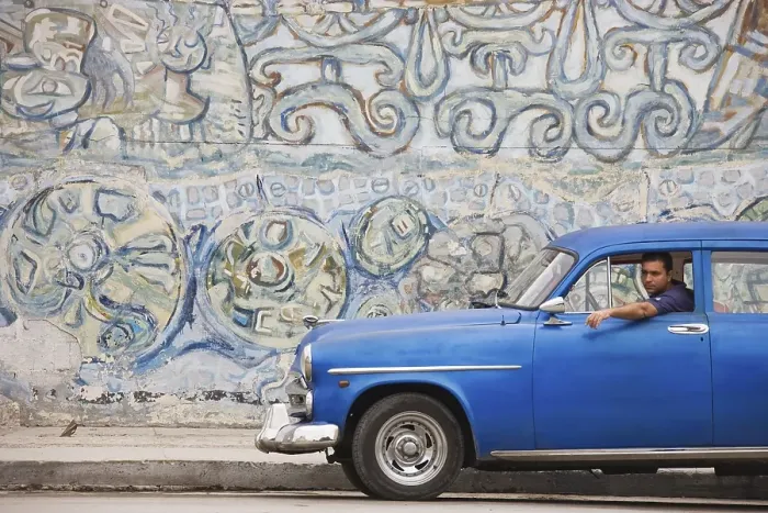 Framed Print : 1950 Chevrolet parked in front of a mural
