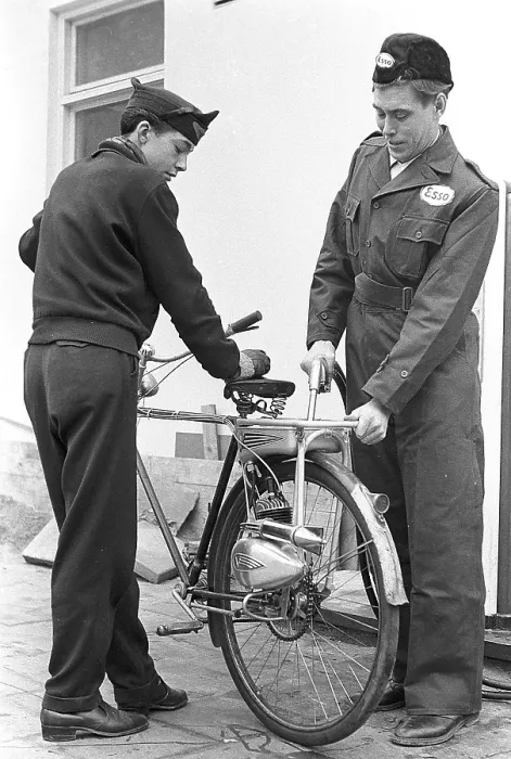 Framed Print : 1950s bicycle extra. The german moped and motor manufacturer Victoria supplies this bicycle help engine called Vicky