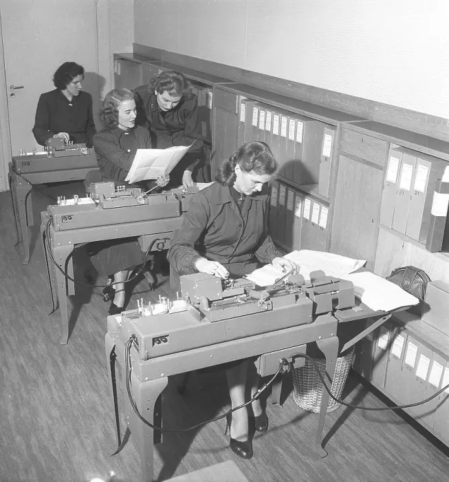 Framed Print : In the 1950s. Female clerks at punch card machines entering information that are transferred into punch cards Framed Print : In the 1950s. Female clerks at punch card machines entering information that are transferred into punch cards
