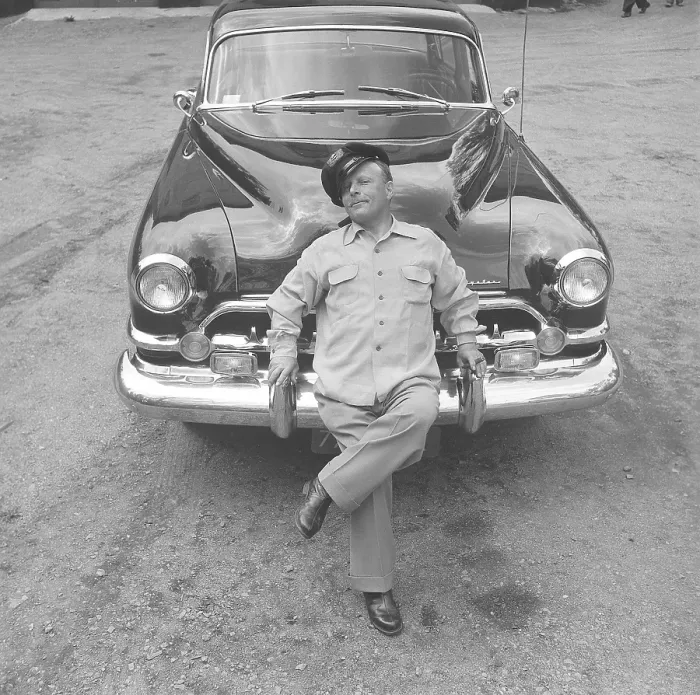 Framed Print : In the 1950s. A man by his car and he is visibly proud and maybe a little cocky. Perhaps not so strange as he is the owner of an impressive American car of the brand Chrysler Imperial Framed Print : In the 1950s. A man by his car and he is visibly proud and maybe a little cocky. Perhaps not so strange as he is the owner of an impressive American car of the brand Chrysler Imperial