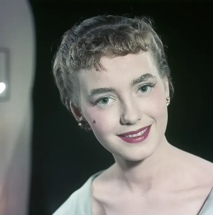 Framed Print : In the 1950s. Portrait of a woman wearing earrings