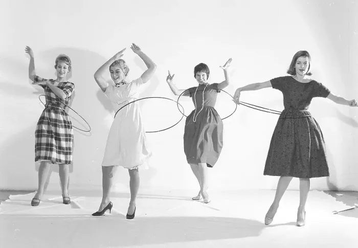 Framed Print : In the 1950s. Women Hula hooping Framed Print : In the 1950s. Women Hula hooping
