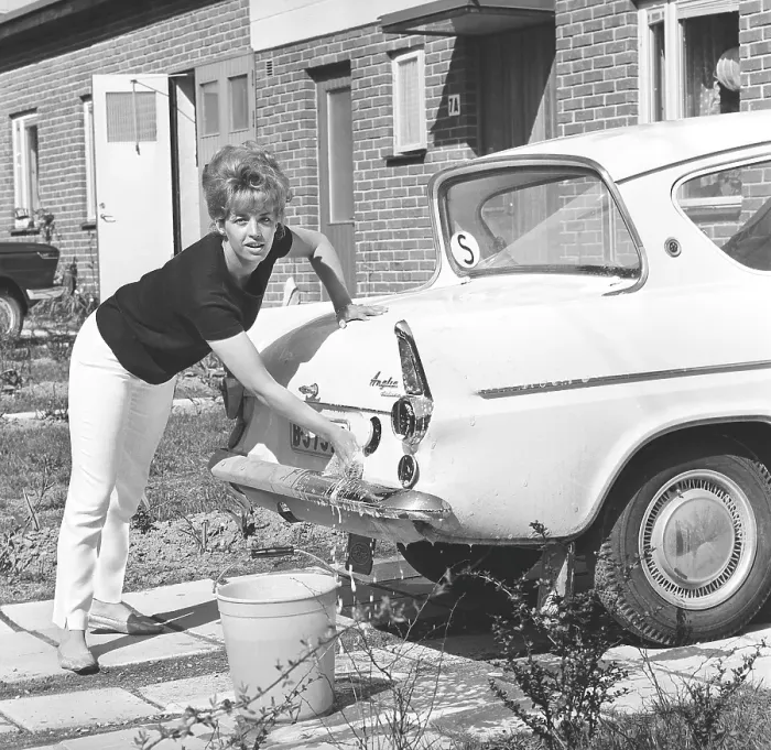 Framed Print : In the 1960s. Actress singer Lill-Babs washing her car Framed Print : In the 1960s. Actress singer Lill-Babs washing her car