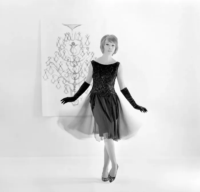 Framed Print : In the 1960s. A fashion model in a typical 1960s dress Framed Print : In the 1960s. A fashion model in a typical 1960s dress