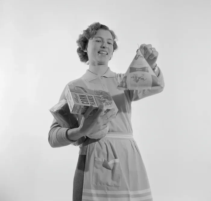 Framed Print : In the 1960s. A woman with groceries Framed Print : In the 1960s. A woman with groceries