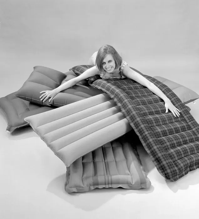 Framed Print : 1960s. A young woman wearing a bikini, in a photographers studio with different types and brands of air mattresses. A picture taken to illustrate the new ones available in different shapes and colors to use the upcoming summer. Sweden 1967
