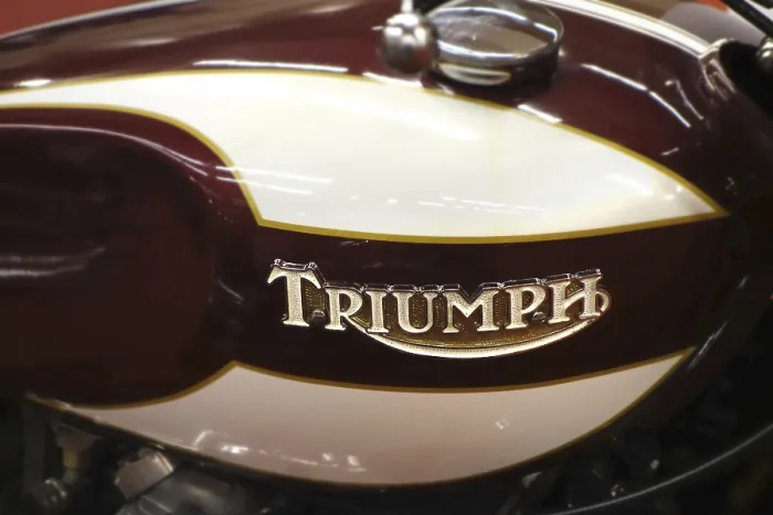 Framed Print : 1975 motorcycle Triumph Trident T160V tank emblem